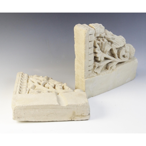 100 - A pair of carved stone brackets, each depicting a female figure in elaborate robes upon a shell and ... 