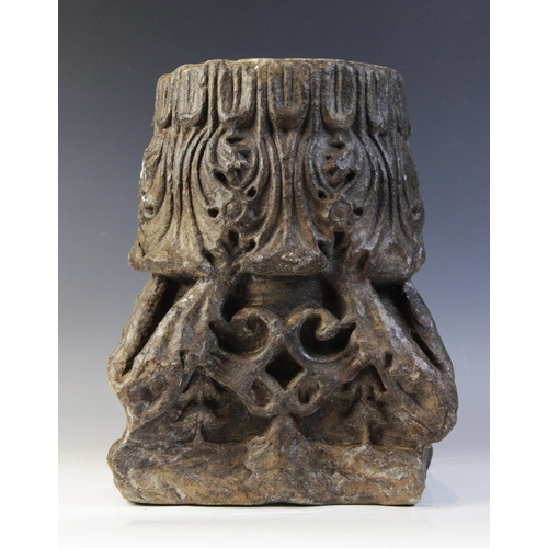 101 - A carved stone Corinthian type architectural capital with distinctive acanthus leaf and tracery carv... 