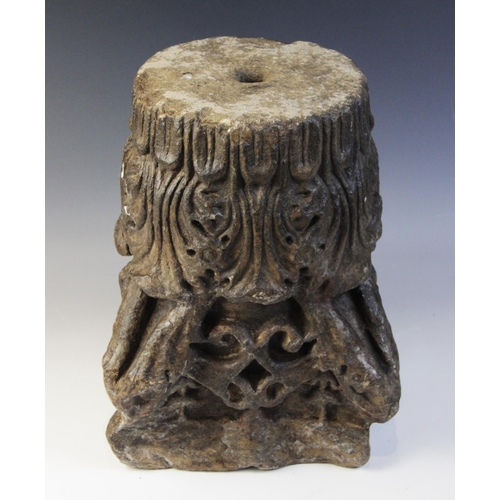 101 - A carved stone Corinthian type architectural capital with distinctive acanthus leaf and tracery carv... 