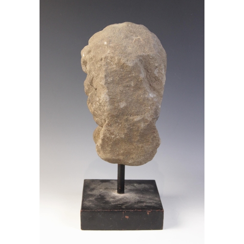 166 - A carved stone male head, 26.5cm high, mounted upon a rod and square plinth base, overall 37.5cm hig... 