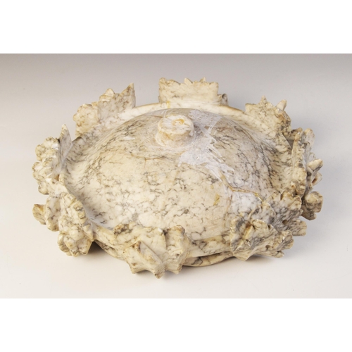 172 - A figured alabaster dish in the Grand Tour manner, the rim modelled as a pierced and relief carved g... 