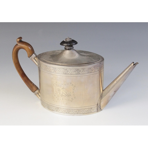 2 - A George III silver teapot, Henry Chawner, London 1792, of oval form with hinged cover, wooden knop ... 