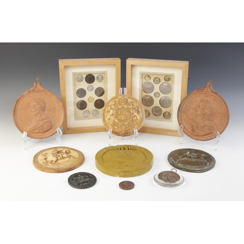 203A - A collection of historical coin casts, ranging from 1st century BC to 2nd century AD, set to two box... 