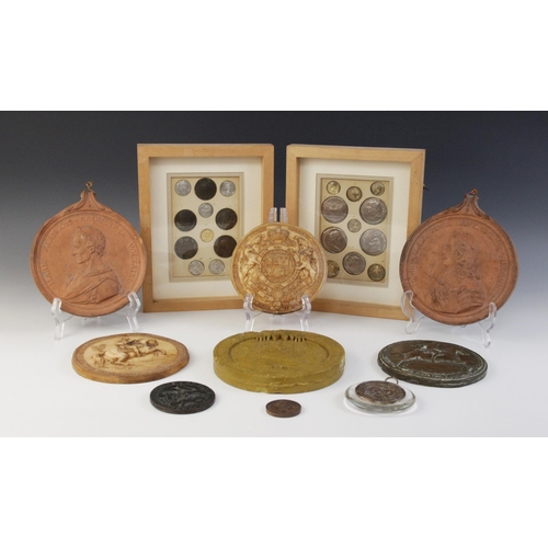 203A - A collection of historical coin casts, ranging from 1st century BC to 2nd century AD, set to two box... 