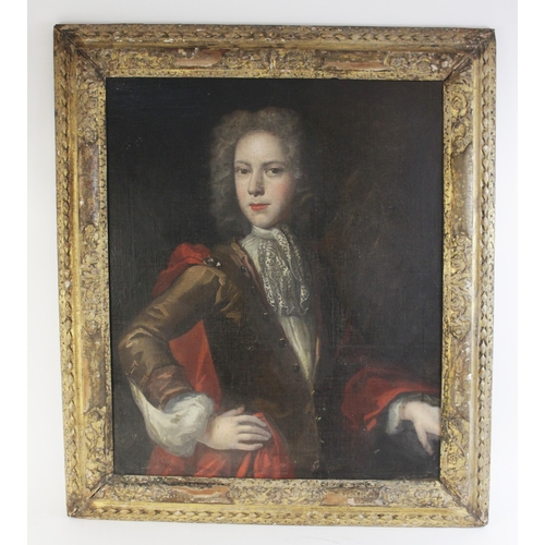 260 - * Follower of Sir Peter Lely (1618-1680), 
Half length portrait of a young man with lace cravat and ... 