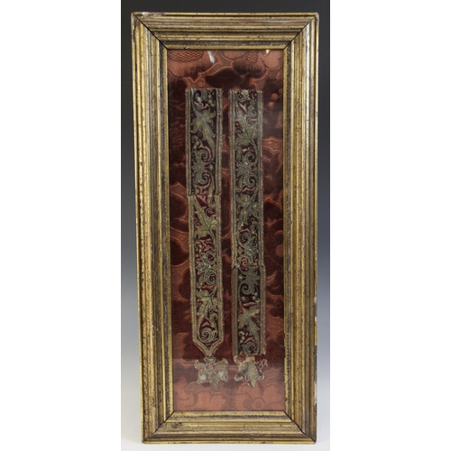 266 - A part sword hanger, possibly 17th century, in crimson velvet with scrolling decoration in polychrom... 