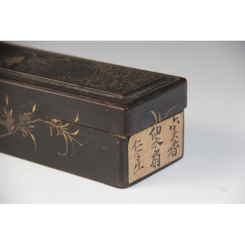 27 - * A carved boxwood Chinese fan, opening to reveal a painted Canton scene, 28cm long (at fault), with... 