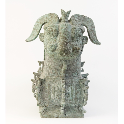 291 - * A large Chinese bronze ritual wine vessel, Guang/Gong, Shang Dynasty style, modelled as a mythical... 