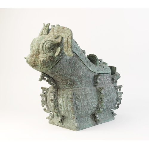 291 - * A large Chinese bronze ritual wine vessel, Guang/Gong, Shang Dynasty style, modelled as a mythical... 