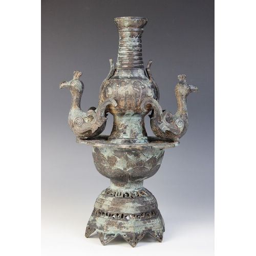 292 - * A Chinese archaic bronze vessel, 20th century, of baluster form and with pierced, domed base appli... 