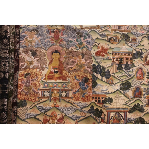 298 - * A Tibetan Shakyamuni thangka, 20th century, featuring the tales of Avadana-Kalpalata, painted in g... 