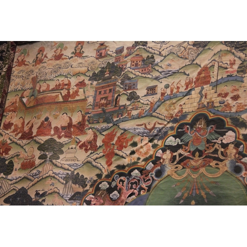 298 - * A Tibetan Shakyamuni thangka, 20th century, featuring the tales of Avadana-Kalpalata, painted in g... 