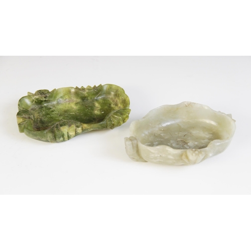 299 - * A Chinese carved Jade lotus dish, the pale green jade carved as a lotus bloom with decoration unde... 