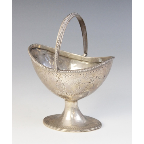3 - A silver coloured swing-handled sugar basket, the oval body upon spreading base, with beaded borders... 