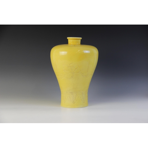 302 - * A Chinese monochrome sgrafitto vase, of meiping form with high shoulders and incised decoration de... 