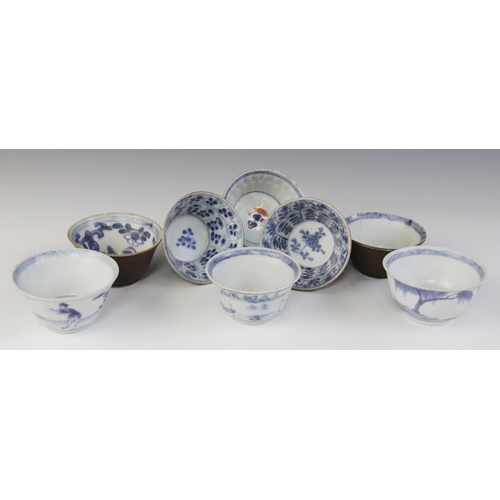 312 - Shipwreck interest: Eight Chinese porcelain tea bowls, 18th century, to include four Batavian glazed... 