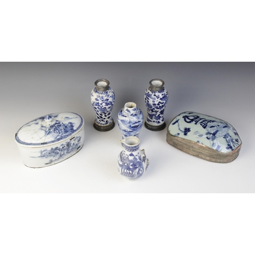 313 - A selection of 18th century Chinese blue and white porcelain, to include a celadon segment or fragme... 