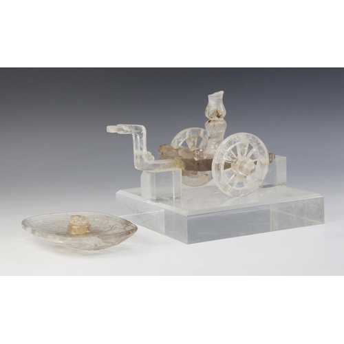 316 - A Chinese rock crystal model of a carriage, the rectangular platform supported by two circular wheel... 