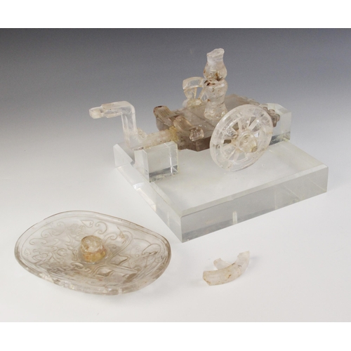 316 - A Chinese rock crystal model of a carriage, the rectangular platform supported by two circular wheel... 