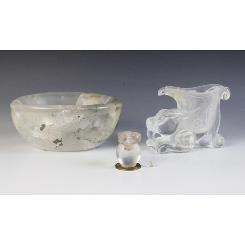 317 - A Chinese carved rock crystal libation cup, realistically carved as a Qilin with archaic detailing, ... 