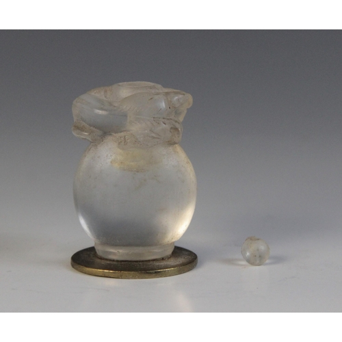 317 - A Chinese carved rock crystal libation cup, realistically carved as a Qilin with archaic detailing, ... 