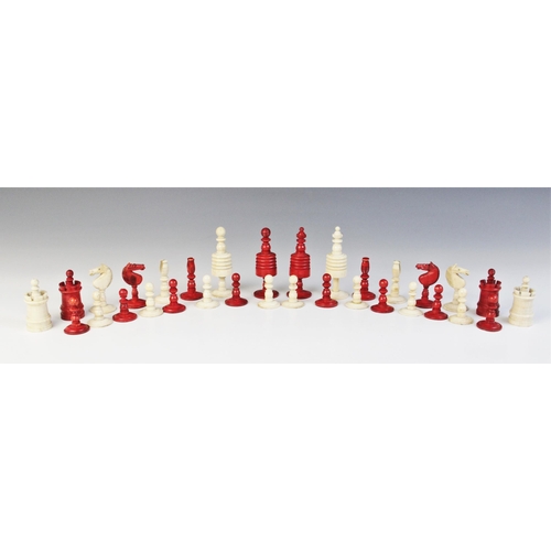 36 - A stained bone continental chess set in the 'Selenus' pattern, 19th century, the kings 8.8cm high, c... 