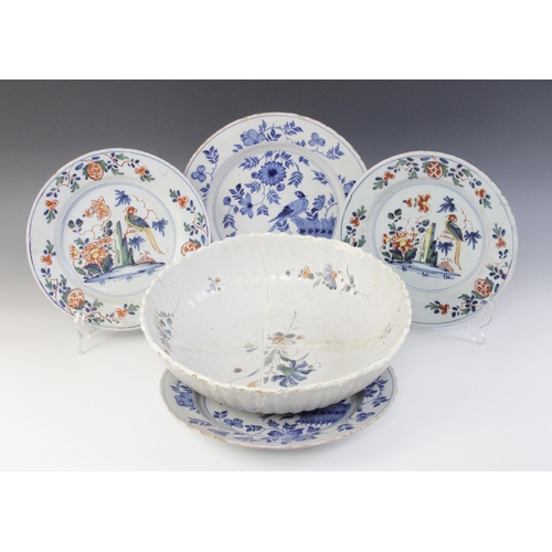 367 - An assorted collection of delft 18th century and later, to include; a fluted bowl, decorated in poly... 