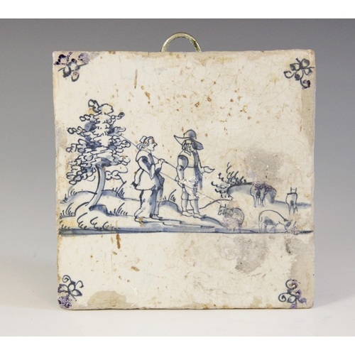 369 - A collection of ten delft tiles, 18th century and later, to include a ship decorated example 13cm x ... 