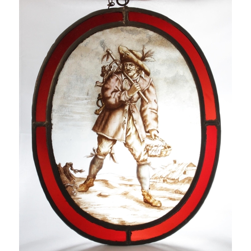 380 - Two stained and painted glass panels, 19th century, one depicting a traveller wearing a tricorn hat ... 