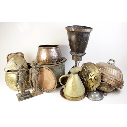 388 - A selection of copper, brass and metal ware, to include a 19th century cast iron door porter modelle... 