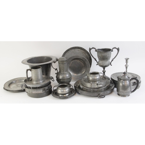 393 - A selection of pewter ware, to include a Liberty & Co Tudric pewter three-piece tea service, each nu... 