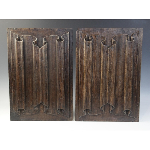 398 - A pair of Elizabethan linen fold panels, Tudor, circa 1560, 43.5cm x 30cm (2)