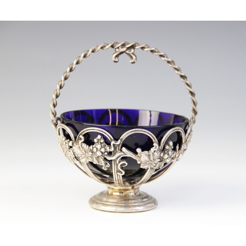 4 - A Victorian silver sugar basket, Thomas Bradbury & Sons, London 1863, the circular pierced bowl with... 