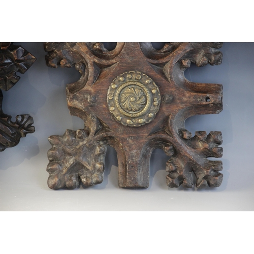 408 - Two late 15th century oak ceiling/roof bosses of barbed quatrefoil form, each with later central bra... 