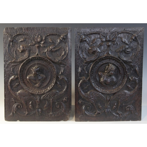 411 - A pair of oak Romayne type panels, circa 1630, one designed with a female bust, the other with a mal... 