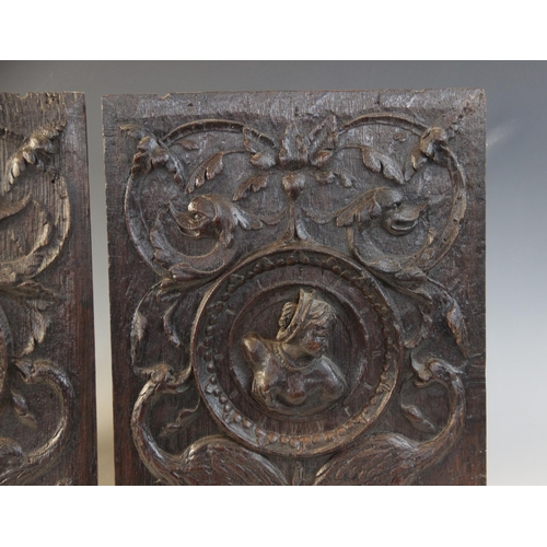 411 - A pair of oak Romayne type panels, circa 1630, one designed with a female bust, the other with a mal... 