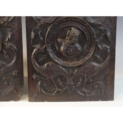 411 - A pair of oak Romayne type panels, circa 1630, one designed with a female bust, the other with a mal... 