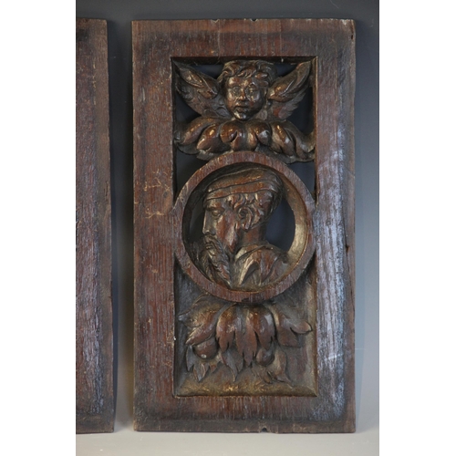 417 - A pair of 16th century oak carved and pierced Romayne type panels, one male, the other female, carve... 