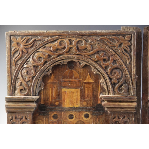 420 - A pair of Elizabeth I, Tudor, 16th century, carved oak and inlaid Nonsuch type panels, each designed... 