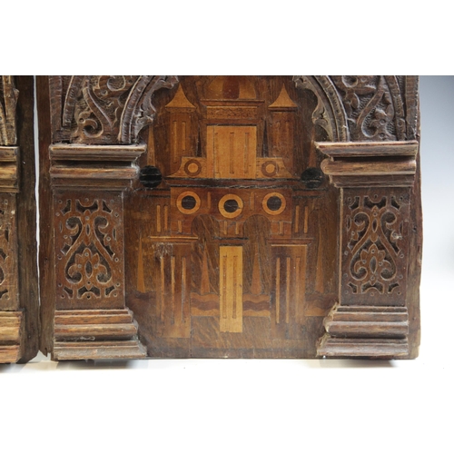 420 - A pair of Elizabeth I, Tudor, 16th century, carved oak and inlaid Nonsuch type panels, each designed... 