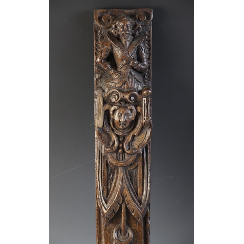 422 - A pair of carved oak terms, Flemish, circa 1600, designed with a male and female figure atop a maske... 