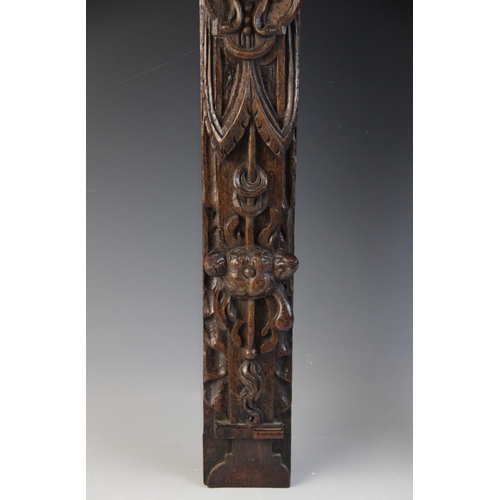 422 - A pair of carved oak terms, Flemish, circa 1600, designed with a male and female figure atop a maske... 