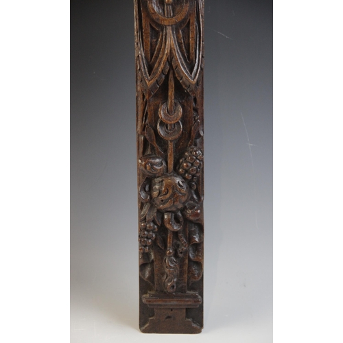 422 - A pair of carved oak terms, Flemish, circa 1600, designed with a male and female figure atop a maske... 