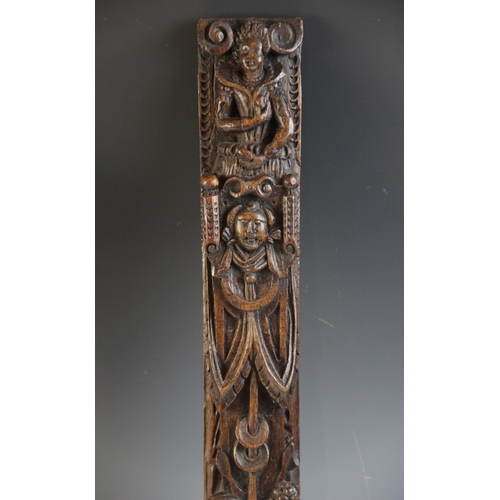 422 - A pair of carved oak terms, Flemish, circa 1600, designed with a male and female figure atop a maske... 