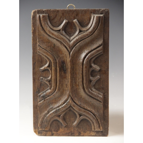 424 - A small Henry VIII carved oak parchemin panel, circa 1520, with ogee details, 28cm x 17cm, with a si... 