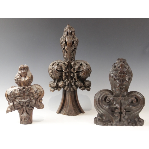 432 - Three late 15th century foliate carved oak poppy head finials, smallest 25.5cm high x 16cm wide, tal... 