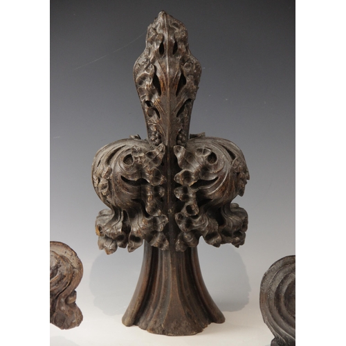 432 - Three late 15th century foliate carved oak poppy head finials, smallest 25.5cm high x 16cm wide, tal... 