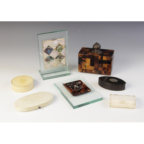 44 - A selection of boxes and card cases, to include: a 19th century ivory snuff box, of rounded rectangu... 