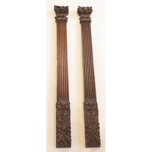 446 - A pair of oak pilasters, with leafy Corinthian and serpent carved capital, reeded pillar and leafy a... 