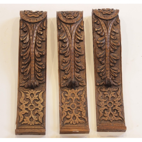 455 - Three 16th century leaf carved corbels, 24cm long together with three 19th century examples 55.5cm l... 